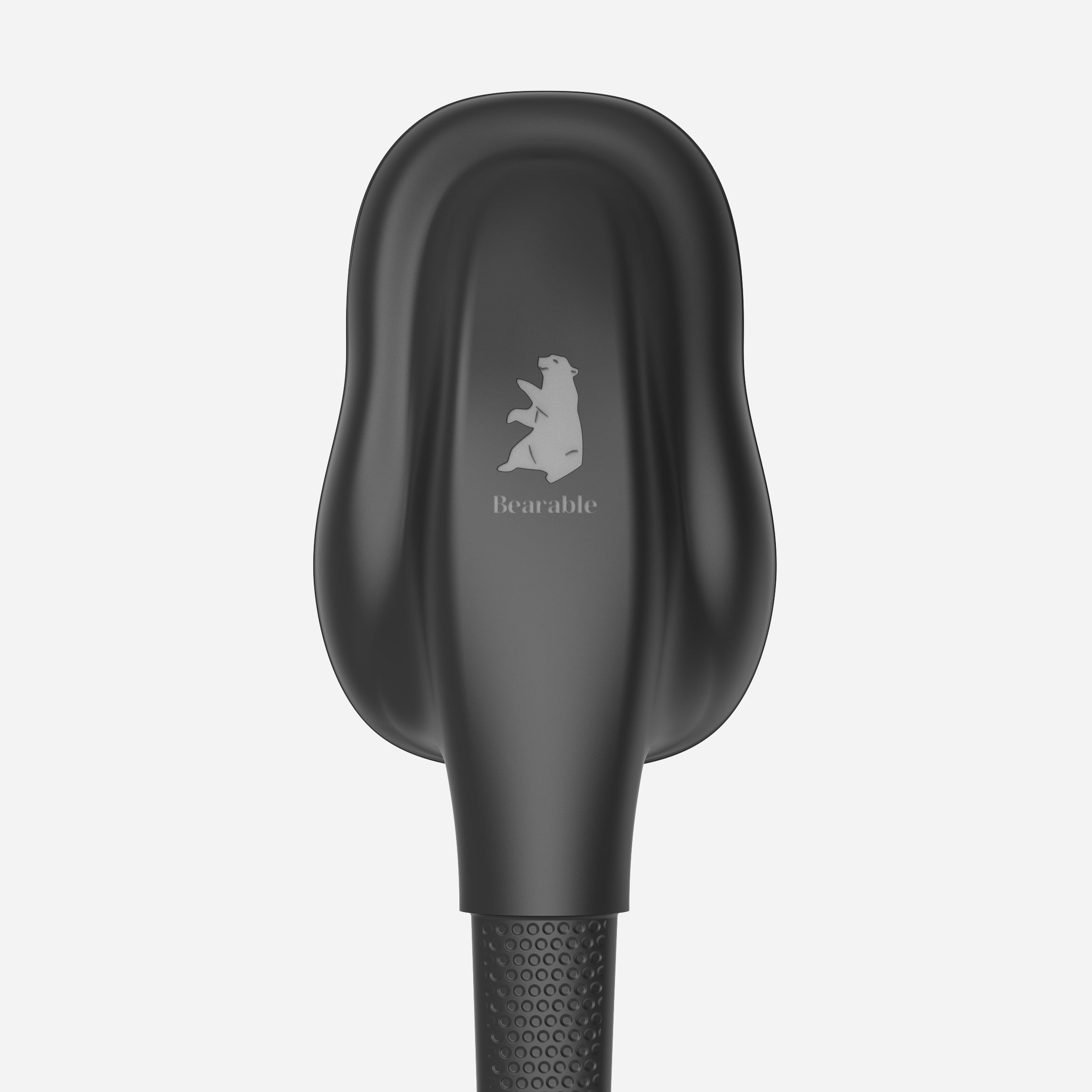 A black brush with a long handle is ideal for scratching and also serves as an effective back scratcher.