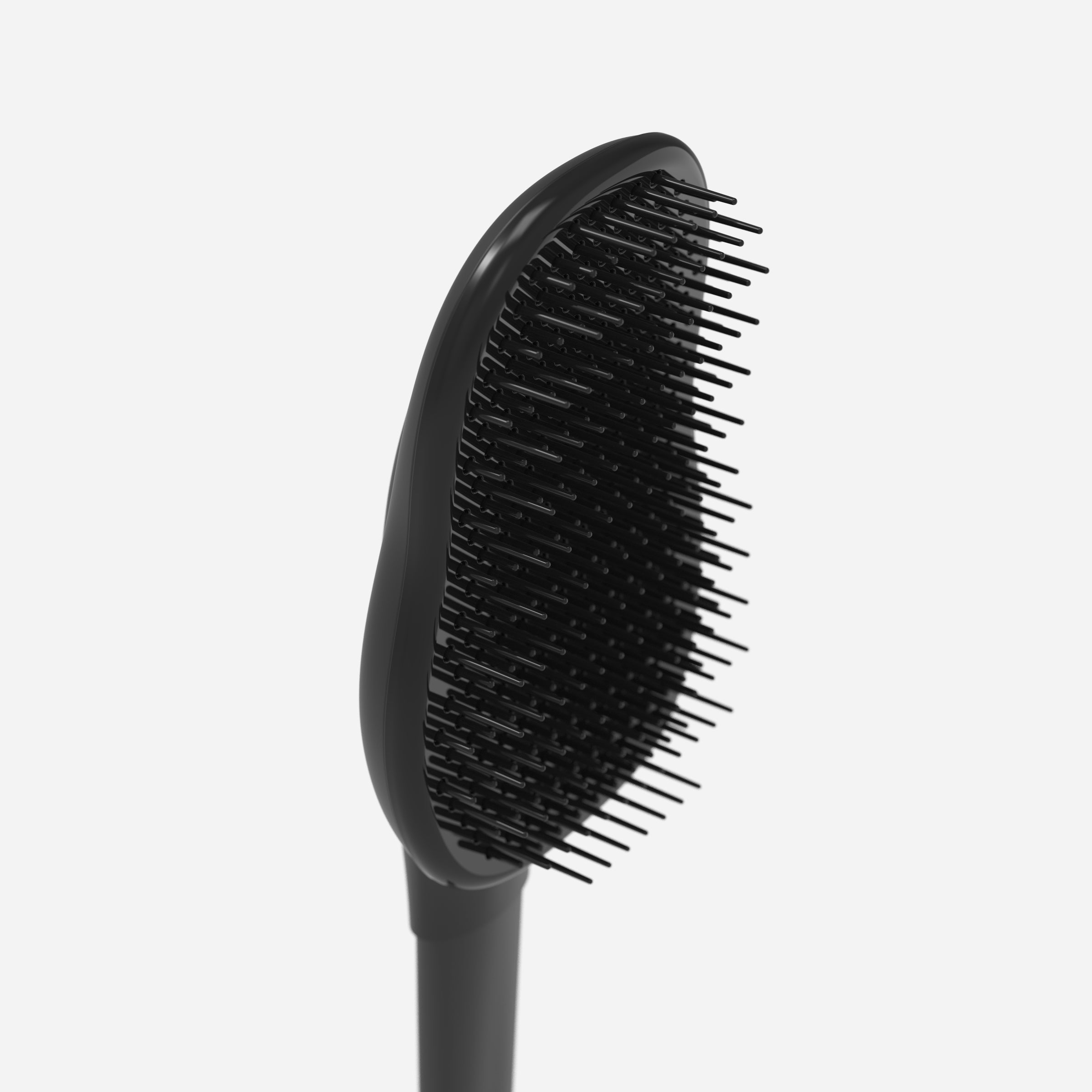 A black brush with a long handle is ideal for scratching and also serves as an effective back scratcher.