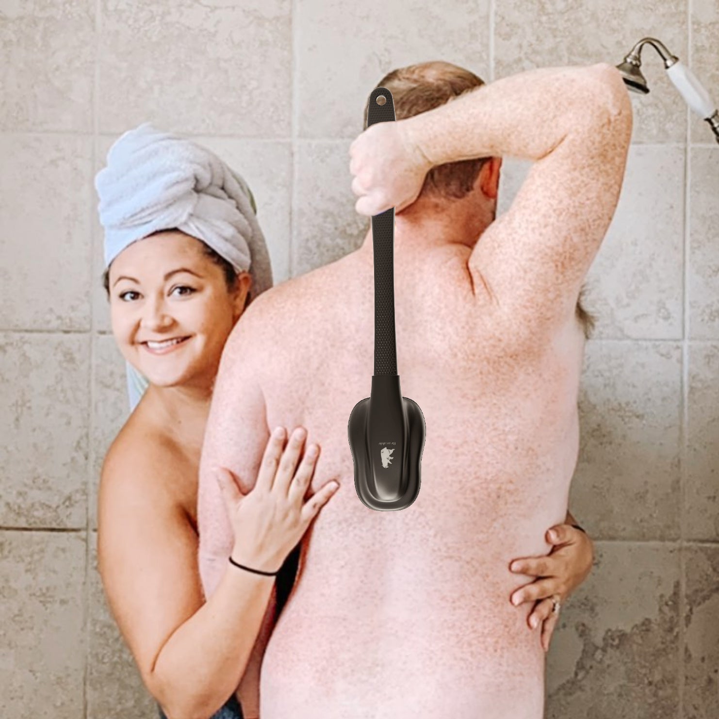 A man and woman in the shower using a hair dryer and a back scratch tool, creating a playful and intimate atmosphere.