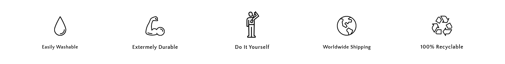 A collection of various writing instruments, including pens, pencils, and a back scratcher, arranged on a clean surface.